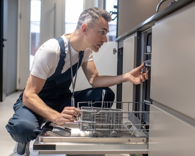 man-touching-details-kitchen